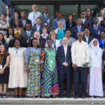 Delegates and distinguished speakers gather for a group photo during G-CAP in Bonn, Germany