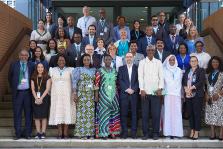 Delegates and distinguished speakers gather for a group photo during G-CAP in Bonn, Germany