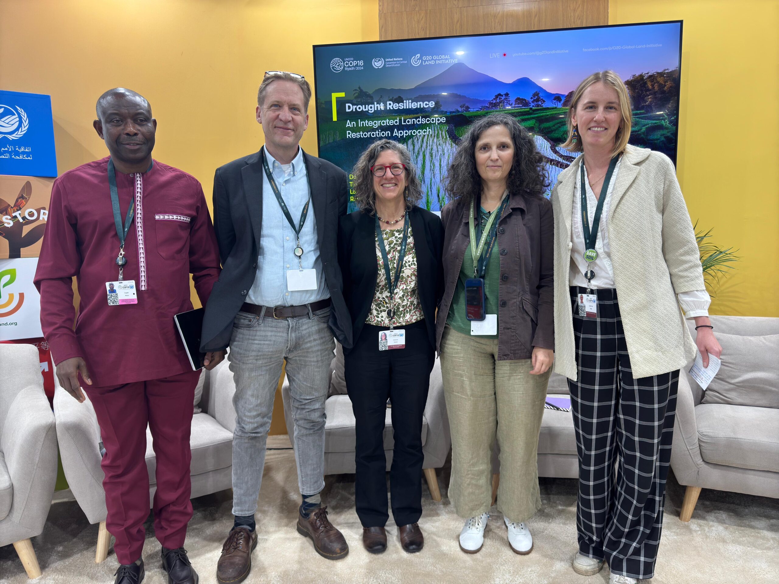 A group of five men and women standing to pose, at a panel discussion at the Restoration Pavilion, on 7 December 2024, in Riyadh, Saudi Arabia.