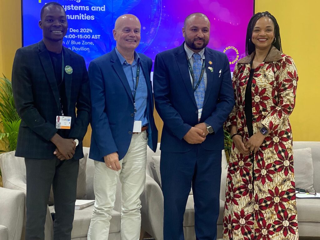 Panelists pose for a group photo after event at the Restoration Pavilion, at UNCCD COP16, on 7 December 2024, in Riyadh, Saudi Arabia