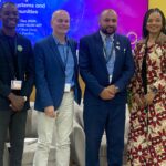 Panelists pose for a group photo after event at the Restoration Pavilion, at UNCCD COP16, on 7 December 2024, in Riyadh, Saudi Arabia