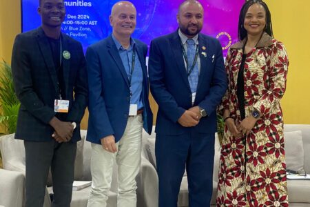 Panelists pose for a group photo after event at the Restoration Pavilion, at UNCCD COP16, on 7 December 2024, in Riyadh, Saudi Arabia