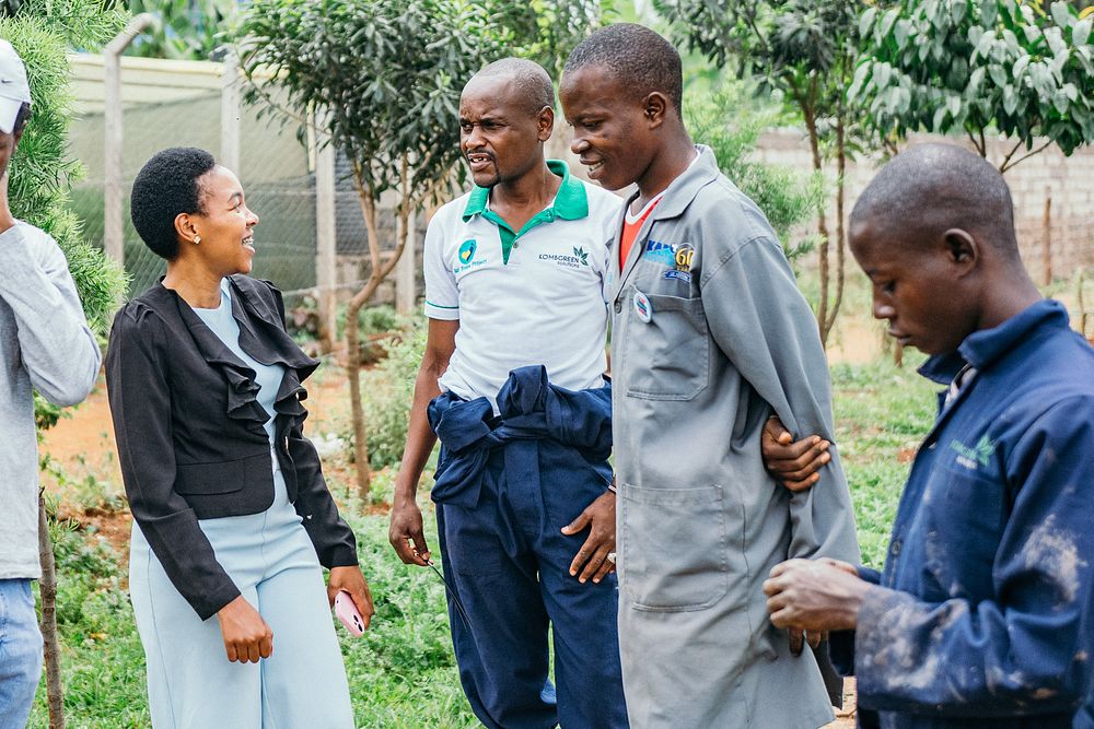 Martin Sikawa with employees