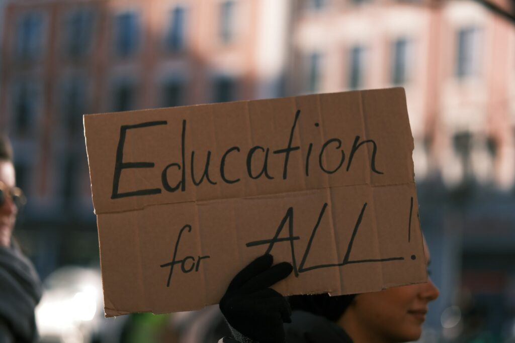 A sign that says, 'Education for All'