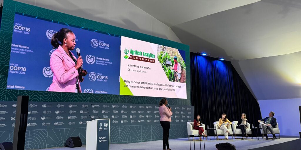 Maryanne Gichanga at a podium