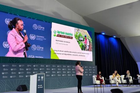 Maryanne Gichanga at a podium