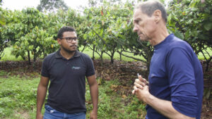 Two men at a cocoa farm