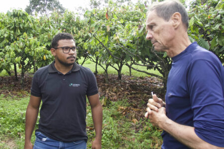 Two men at a cocoa farm