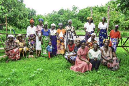 Project beneficiaries gather at the biogas digester site